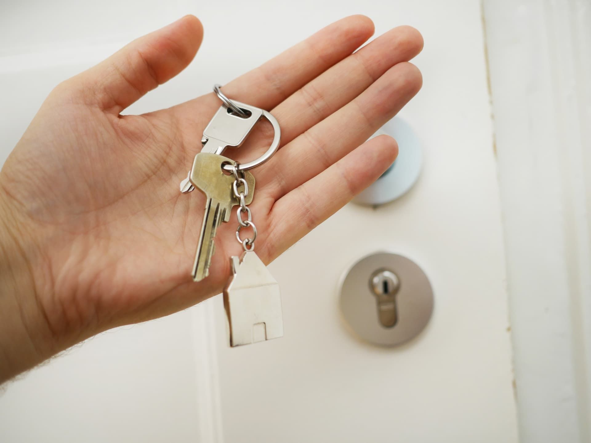 Tenant holding the keys to their new property